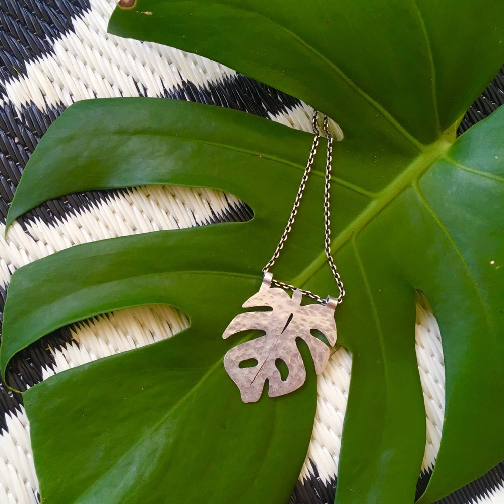 Artisan Monstera leaf silver pendant hammered